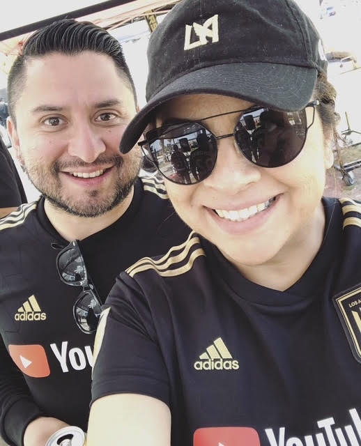 A photo of my partner and I at an LAFC match